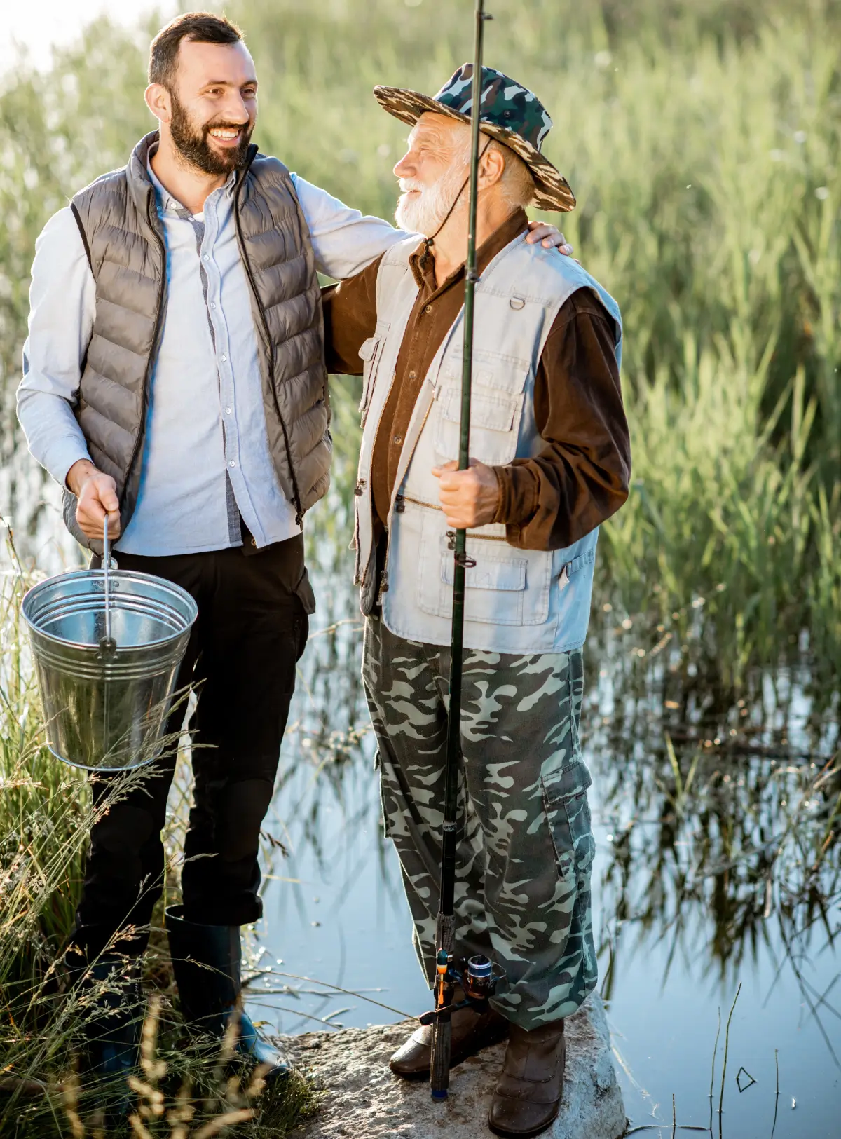 Grandfather and older son fishing