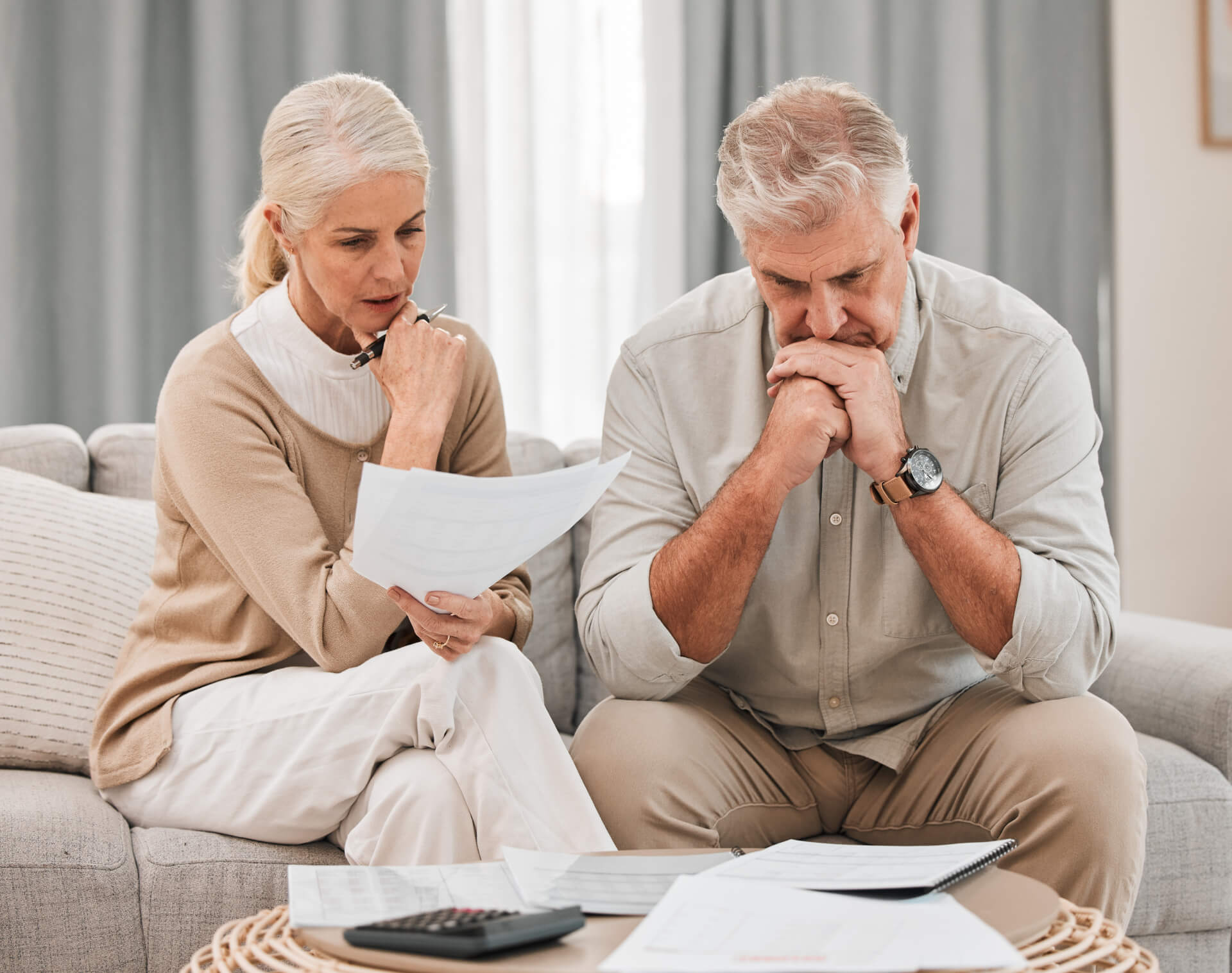 Woman and man with retirement documents